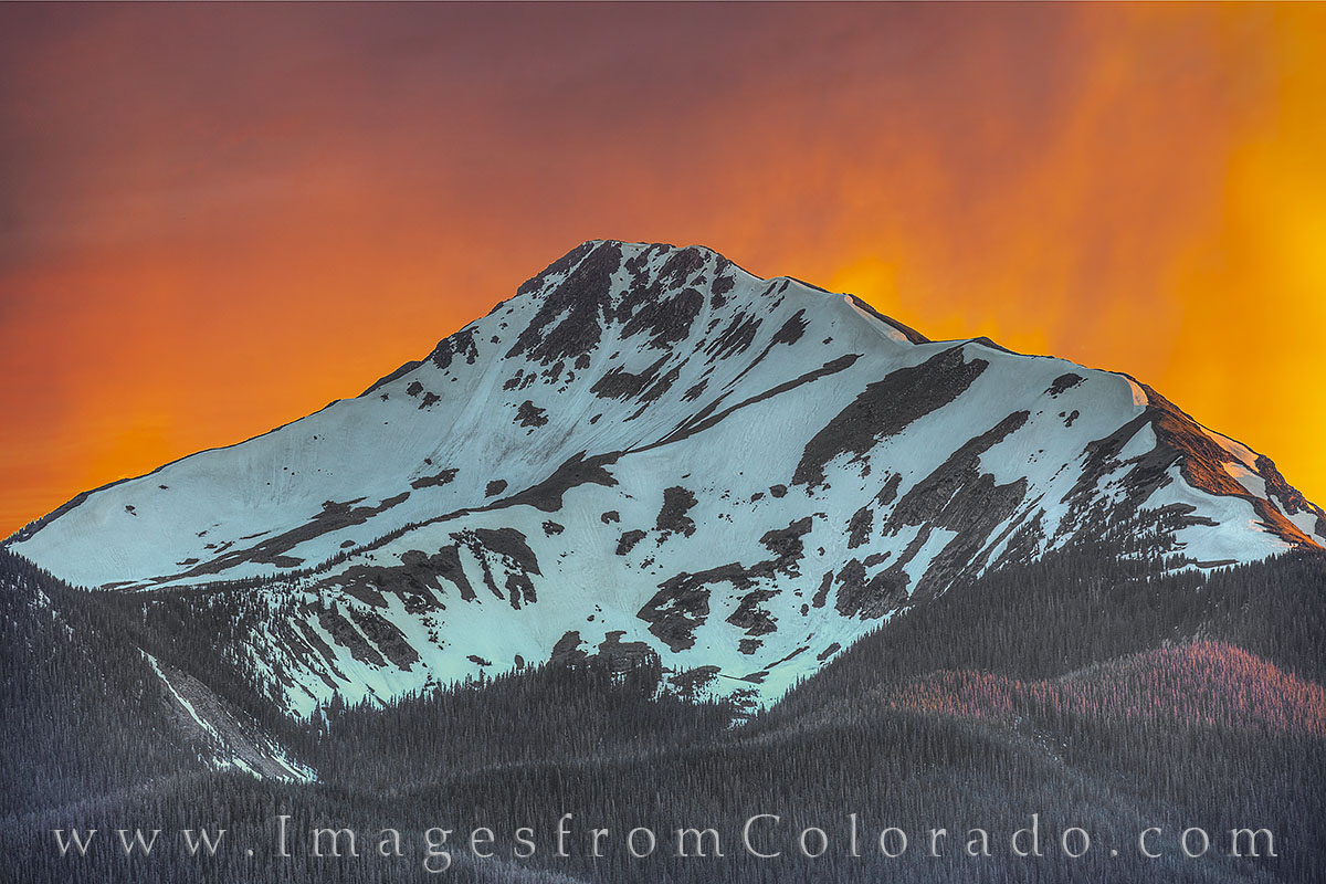 The sky turned orange for a few minutes over Byers Peak. The sunset colors were amazing and mysterious on this iconic peak just...