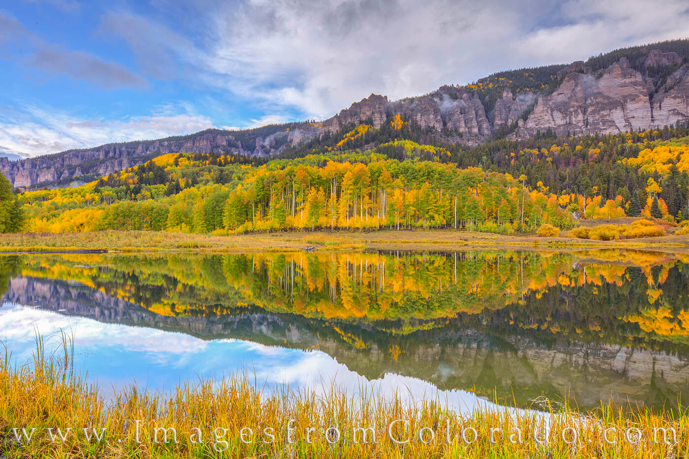 Early Autumn really shines in this image from Clear Lake, a short hike from Rowdy Lake, near Owl Creek Pass. A storm has blown...