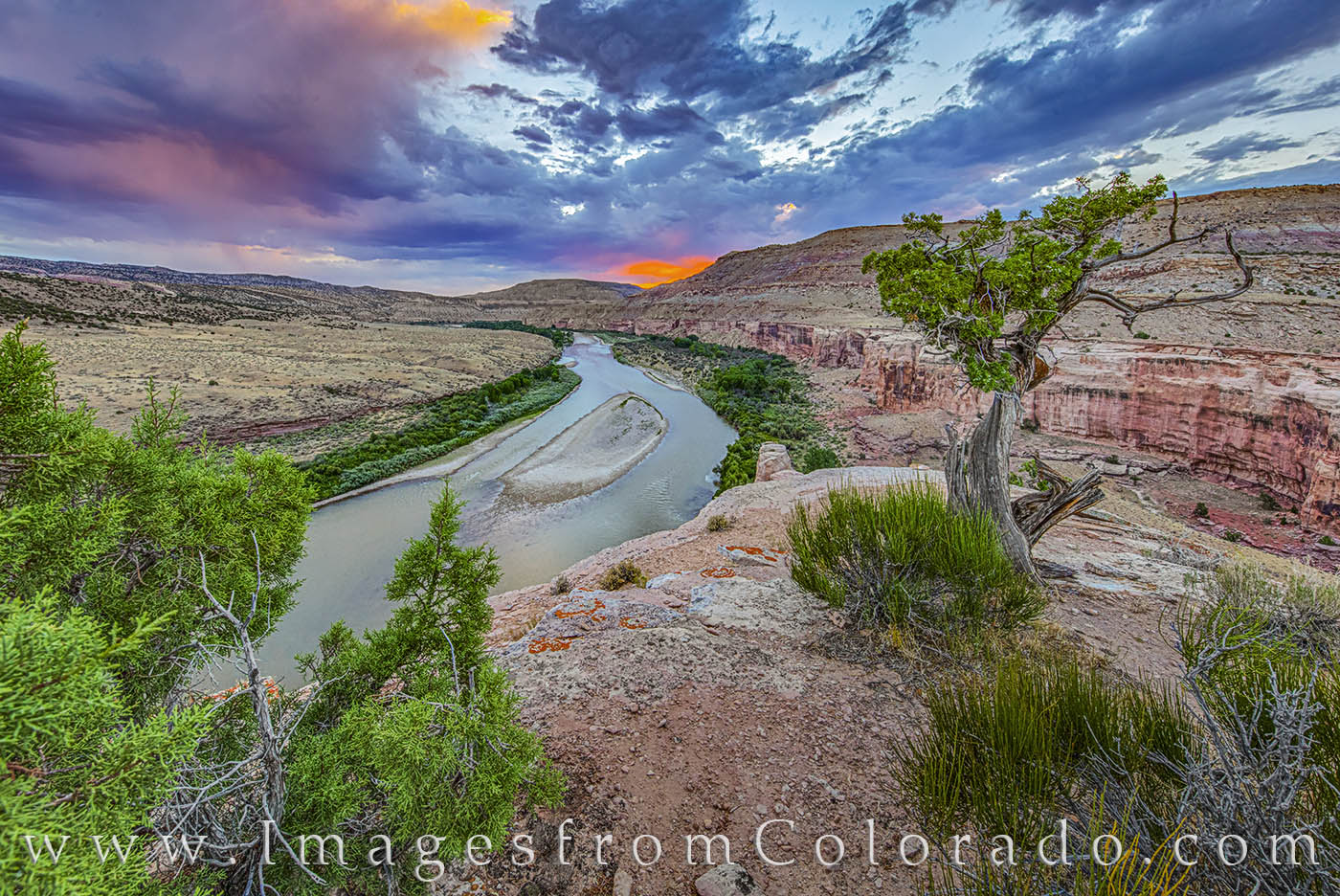 Hiking along the bike trails of the Kokopelli Trail, some locals and I came across this amazing view of the Colorado River and...