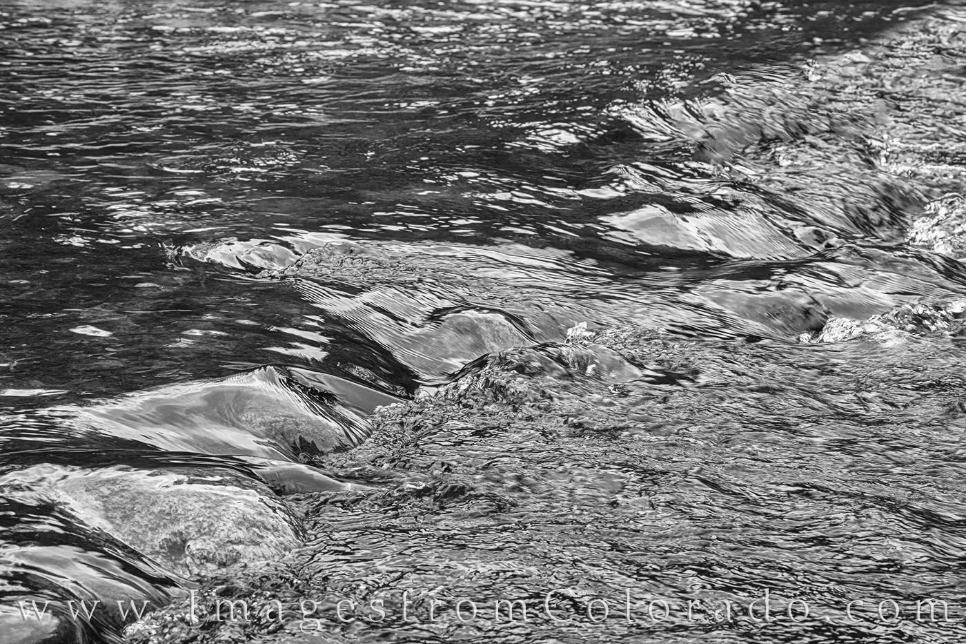 During spring runoff, the cold water of the Fraser River runs clear and clean. This little rapid was taken along the Fraser River...