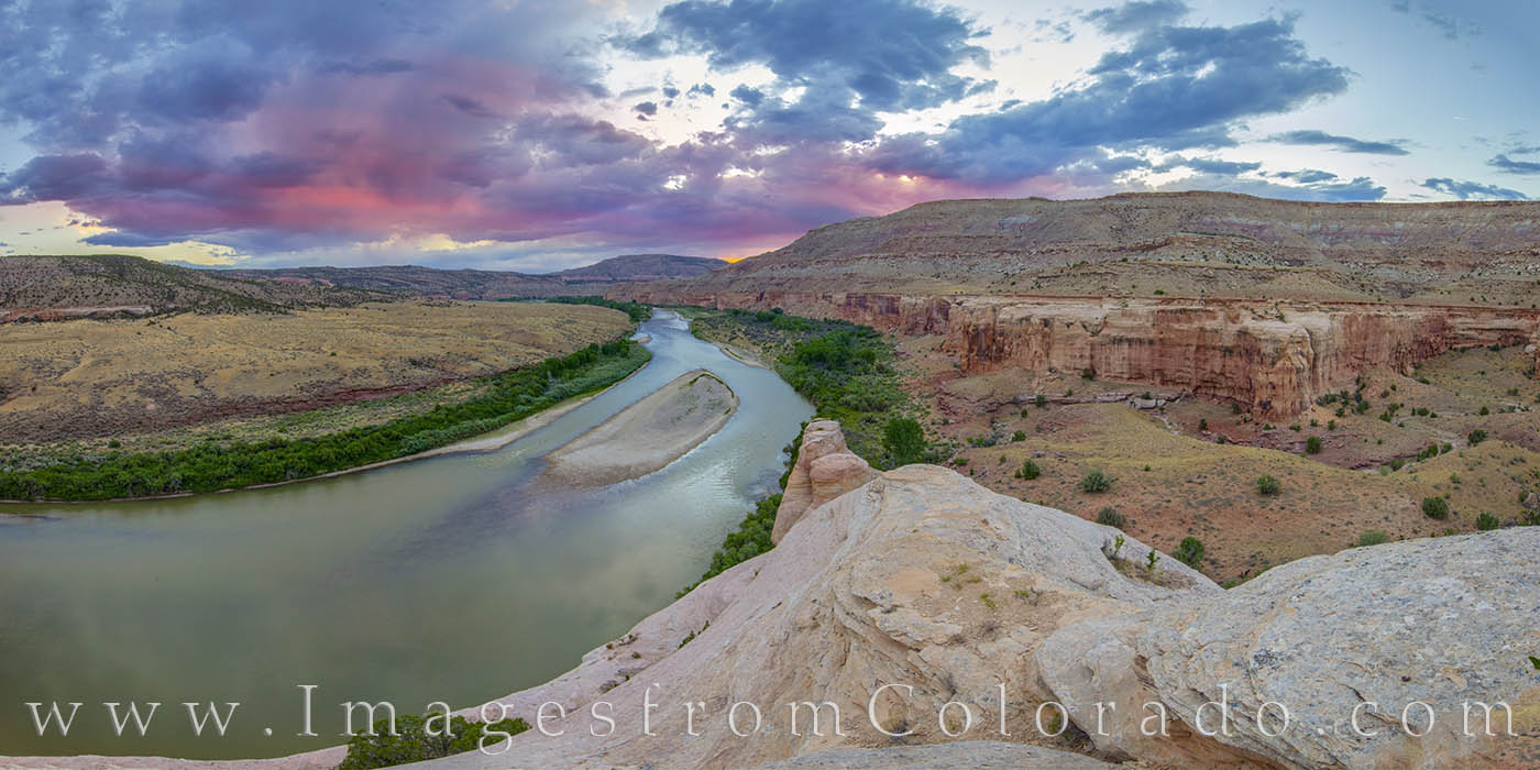 From a beautiful sunset on the western slope in Mesa County, this panorama shows the Colorado River as if rolls through Horsethief...