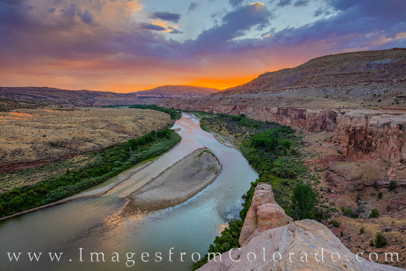 The clouds turned pink for a few short moments as sunset fell across Horsethief Canyon and the Colorado River. Seen here from...