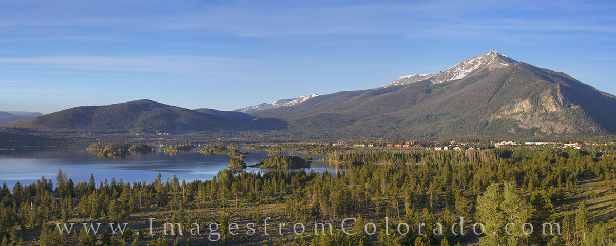 Lake Dillon awakens to a beautiful summer morning in June. High clouds overhead drift by, and the lake below is calm, cold, and...