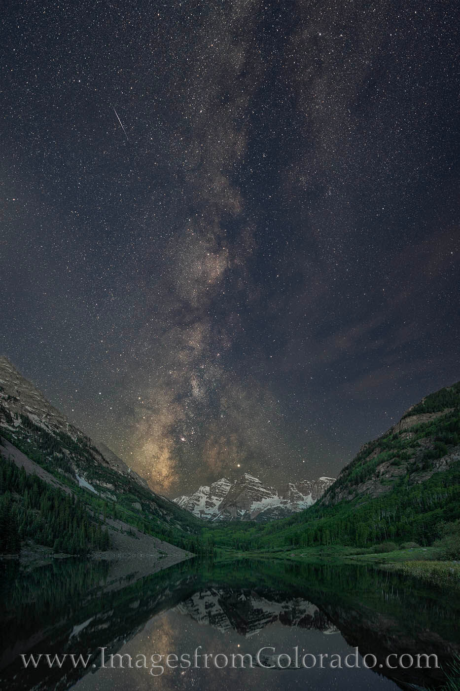 High clouds drifted by as I was photographing the Milky Way over the iconic Maroon Bells near Aspen and Snowmass, Colorado. I...