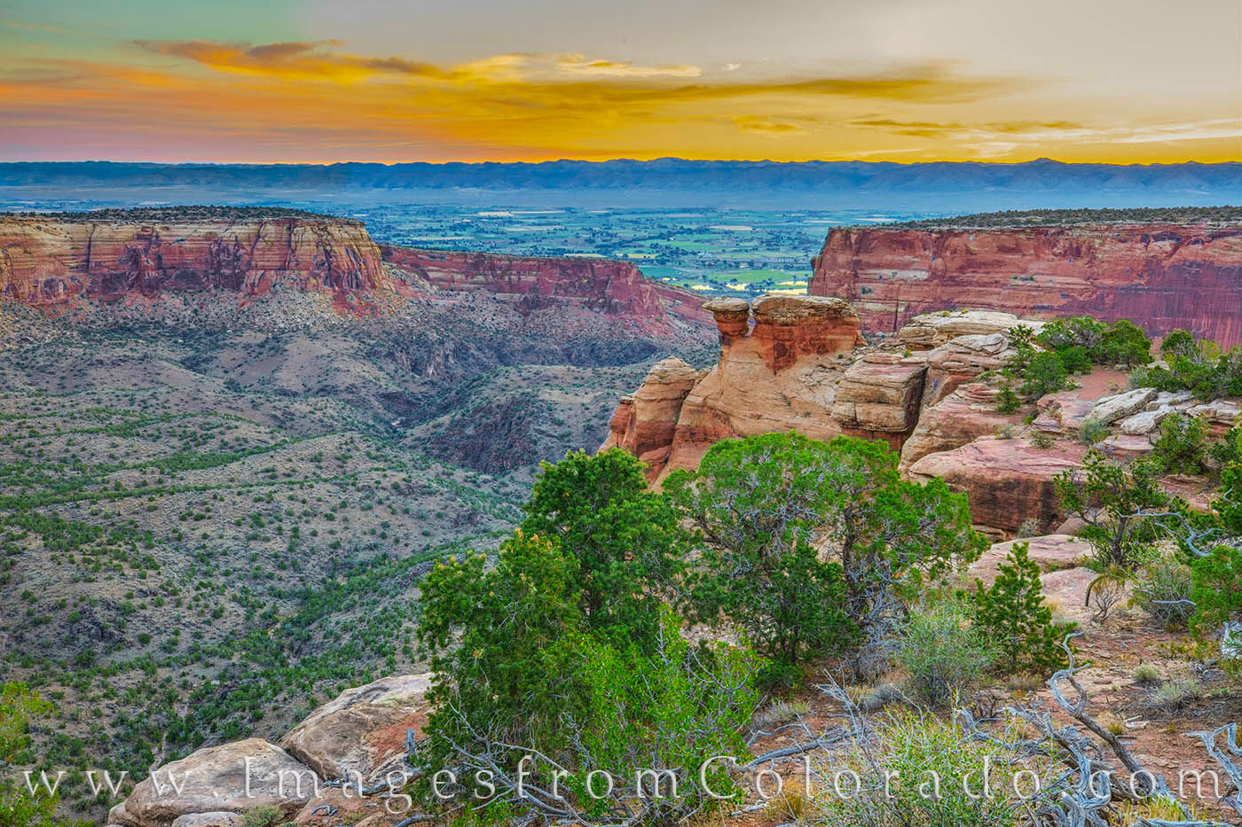 The depth and colors of Monument Canyon, one of the beautiful canyons of Colorado National Monunent, is seen here at sunrise...