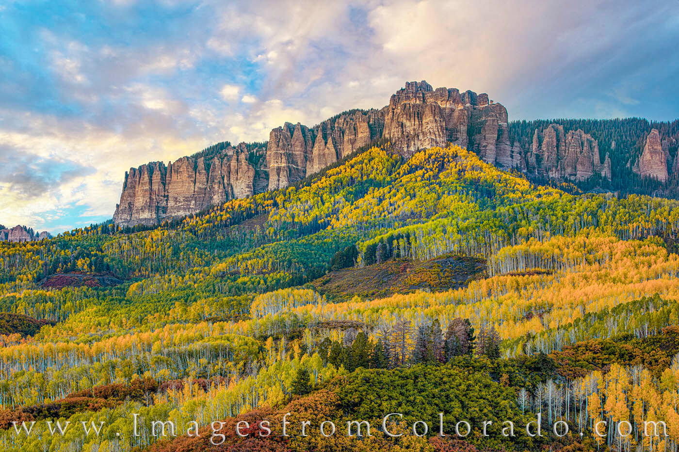 From a little turnout on Owl Creek Pass near Ridgway, the fall colors of the San Juan range really show their brilliance on a...