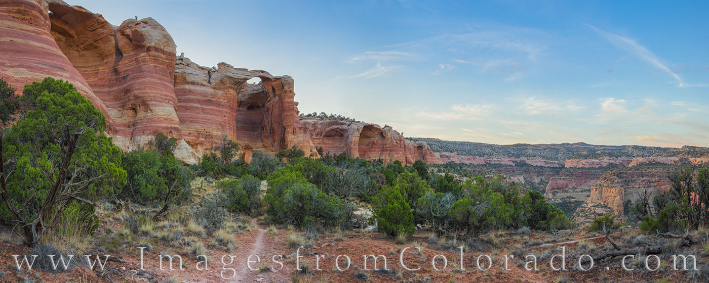 From the trail below Rattlesnake Arch (also known as Centennial Arch), this panorama shows the amazing colors and rock formations...