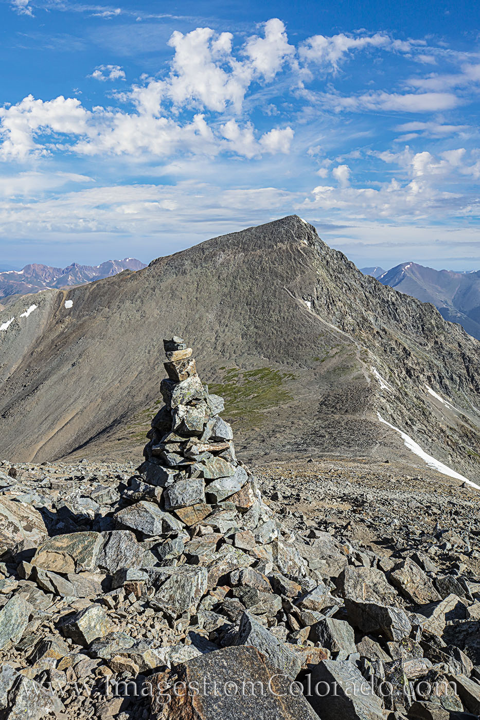 The trail down from Grays Peak to the saddle between Grays and Torreys and back up again is long and steep, but the views are...